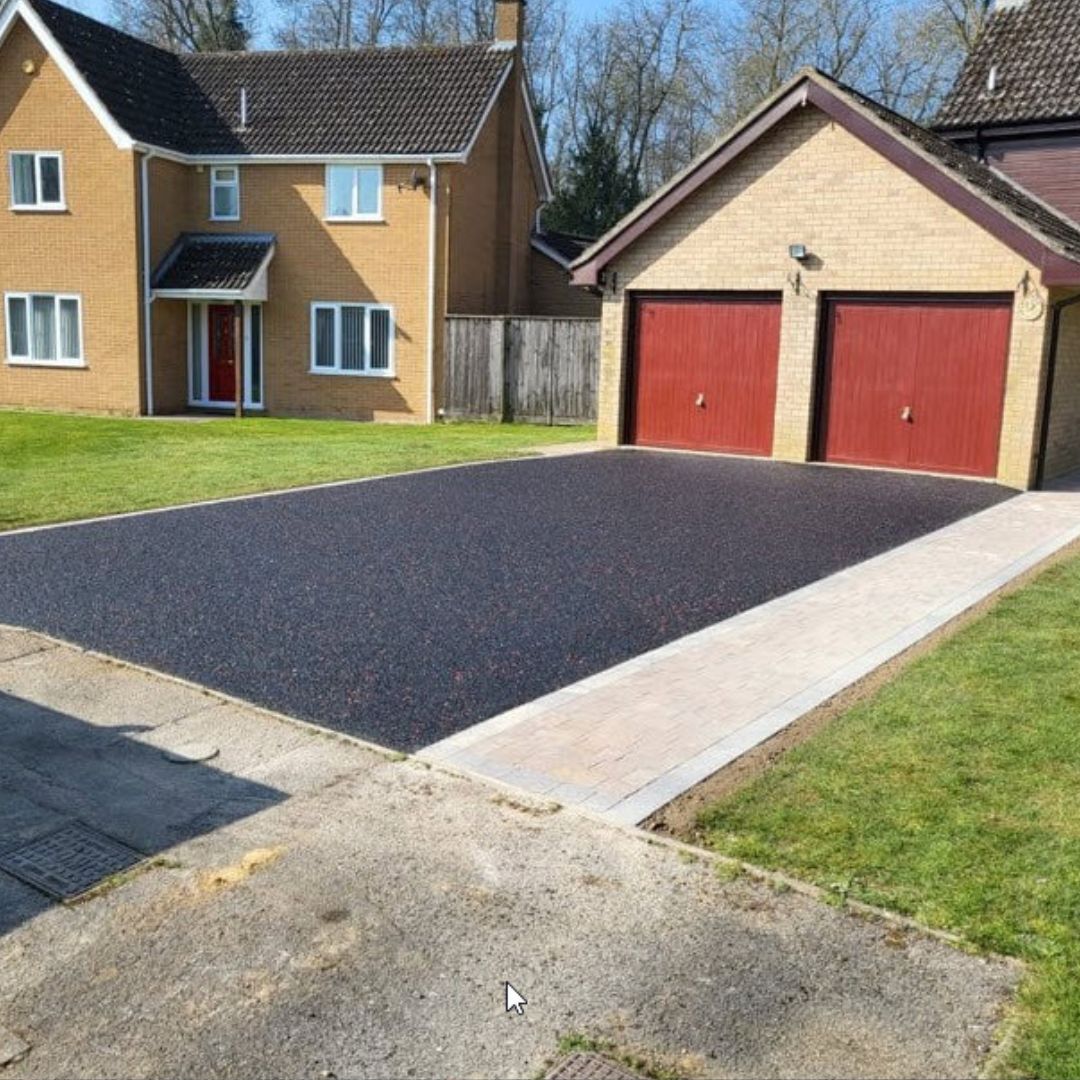 Tarmac driveway with block paved path and edging