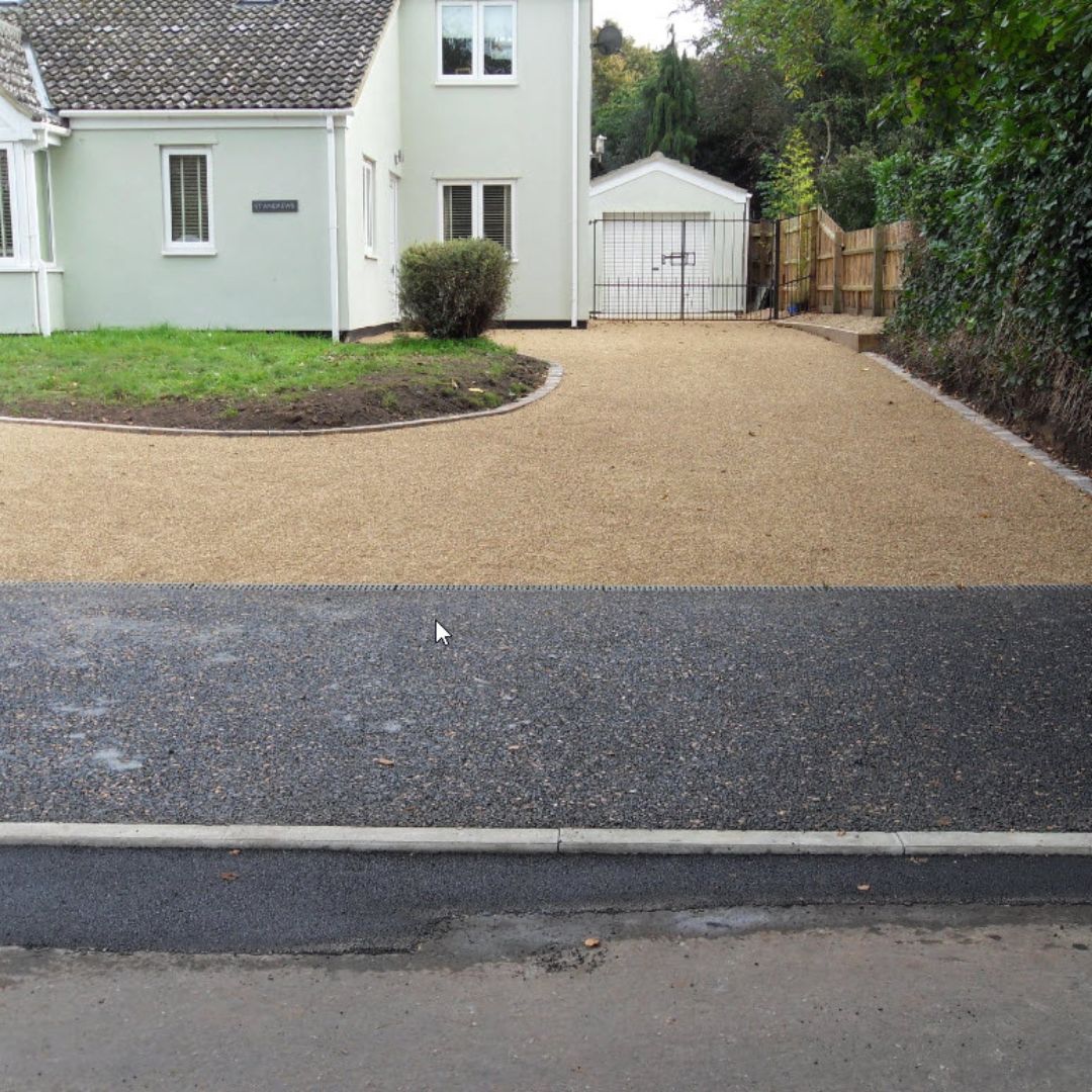 Tarmac driveway with shingle and block kerb edging